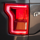 Illustration for article titled Hot take: New F-150 tail lights arent worth anything to other drivers in heavy rain.